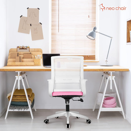 pink office chair in front of desk