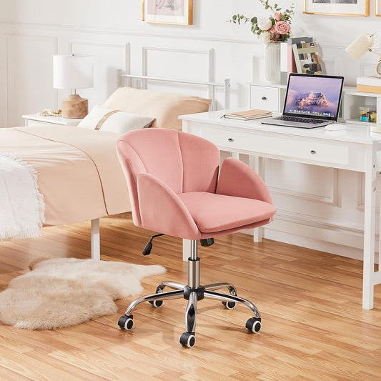 pink velvet swivel chair at bedroom vanity desk