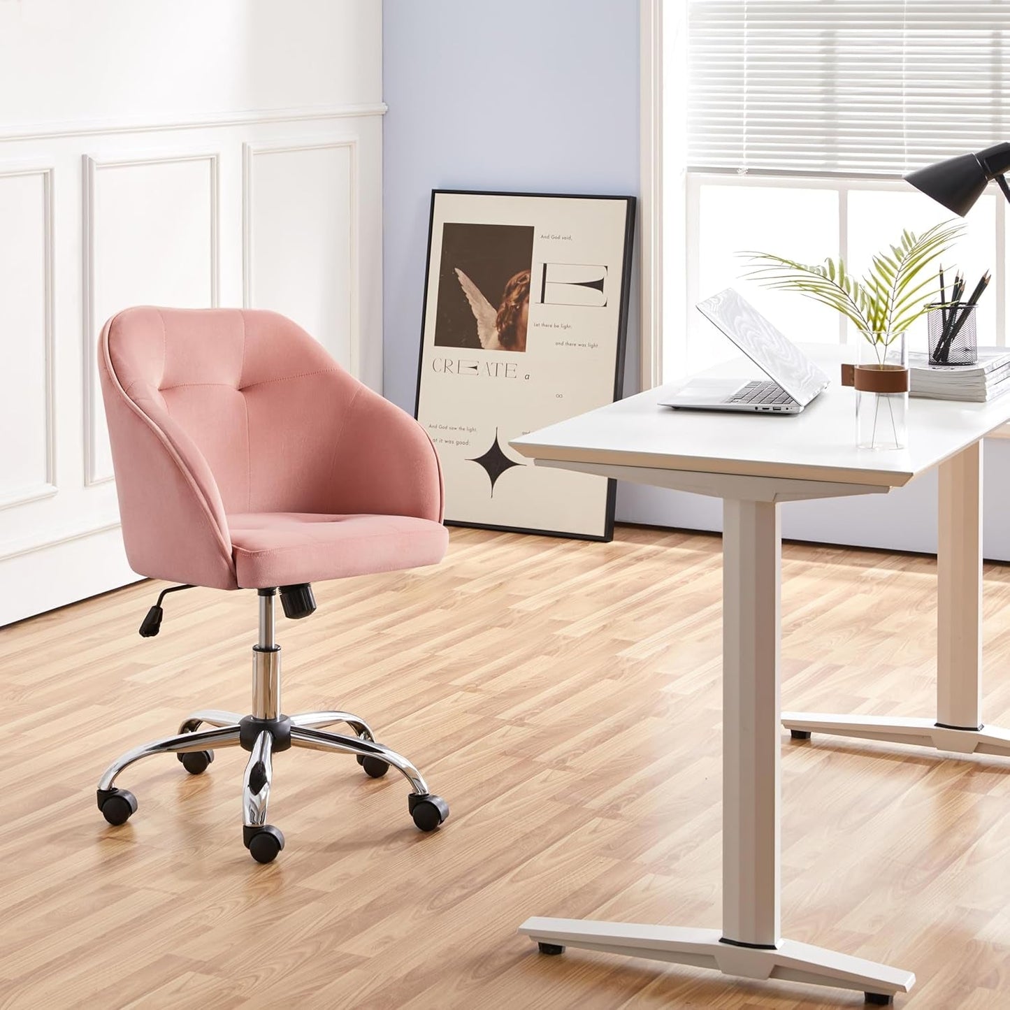 pink upholstered velvet office chair in home desk setup