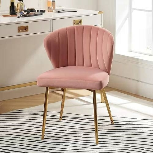 Pink Velvet Upholstered Wingback Accent Side Chair with Gold Metal legs at bedroom vanity wide view