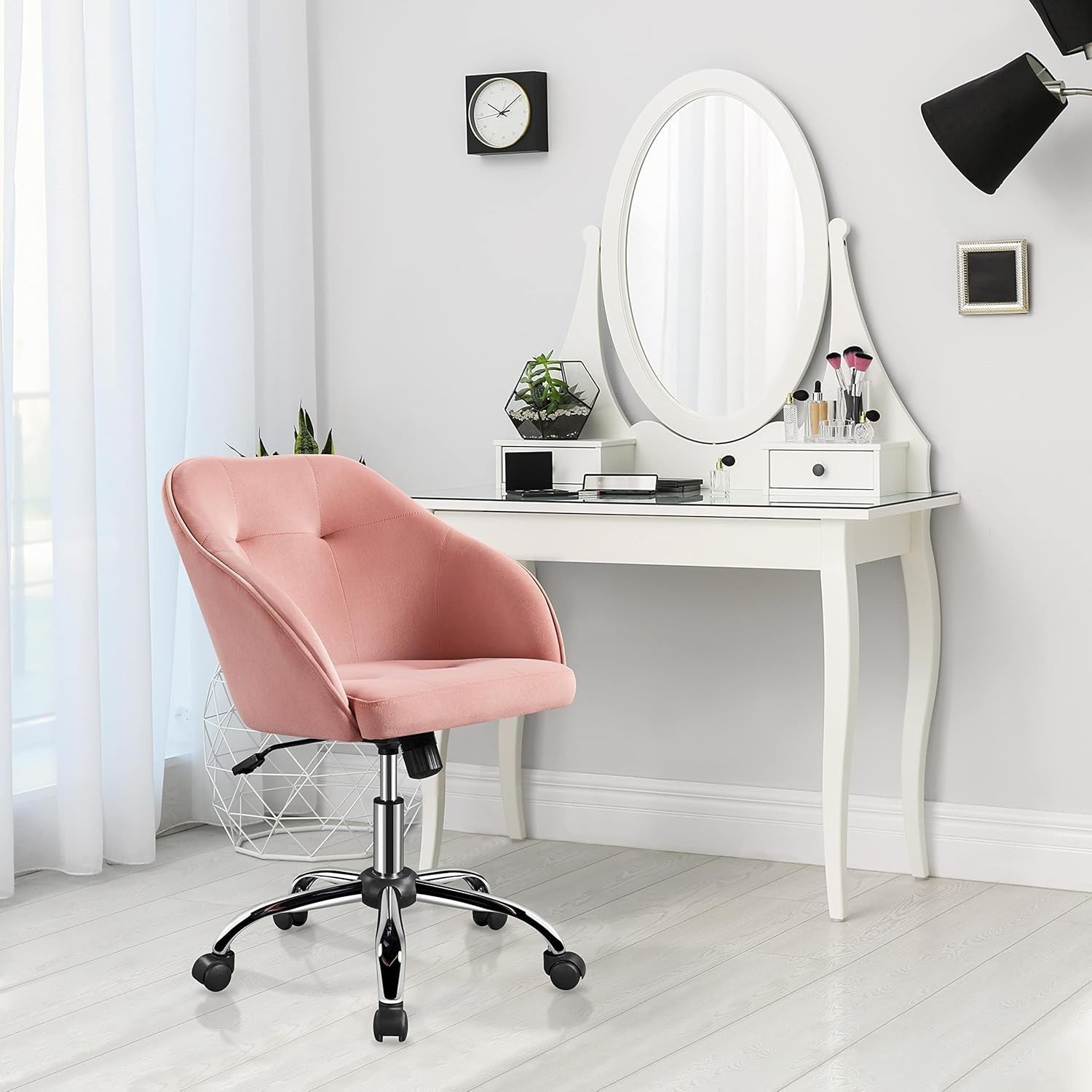 pink upholstered velvet office chair at a bedroom vanity for makeup table