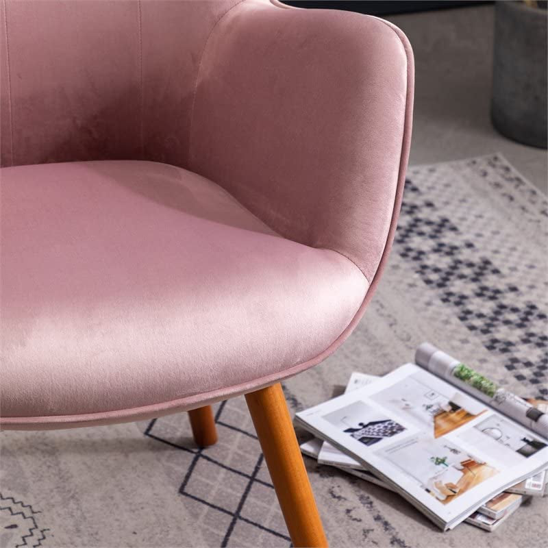 Contemporary Dark Pink Velvet Accent Chair with Tufted Back as a side chair in a living room seat and soft sloped arm closeup